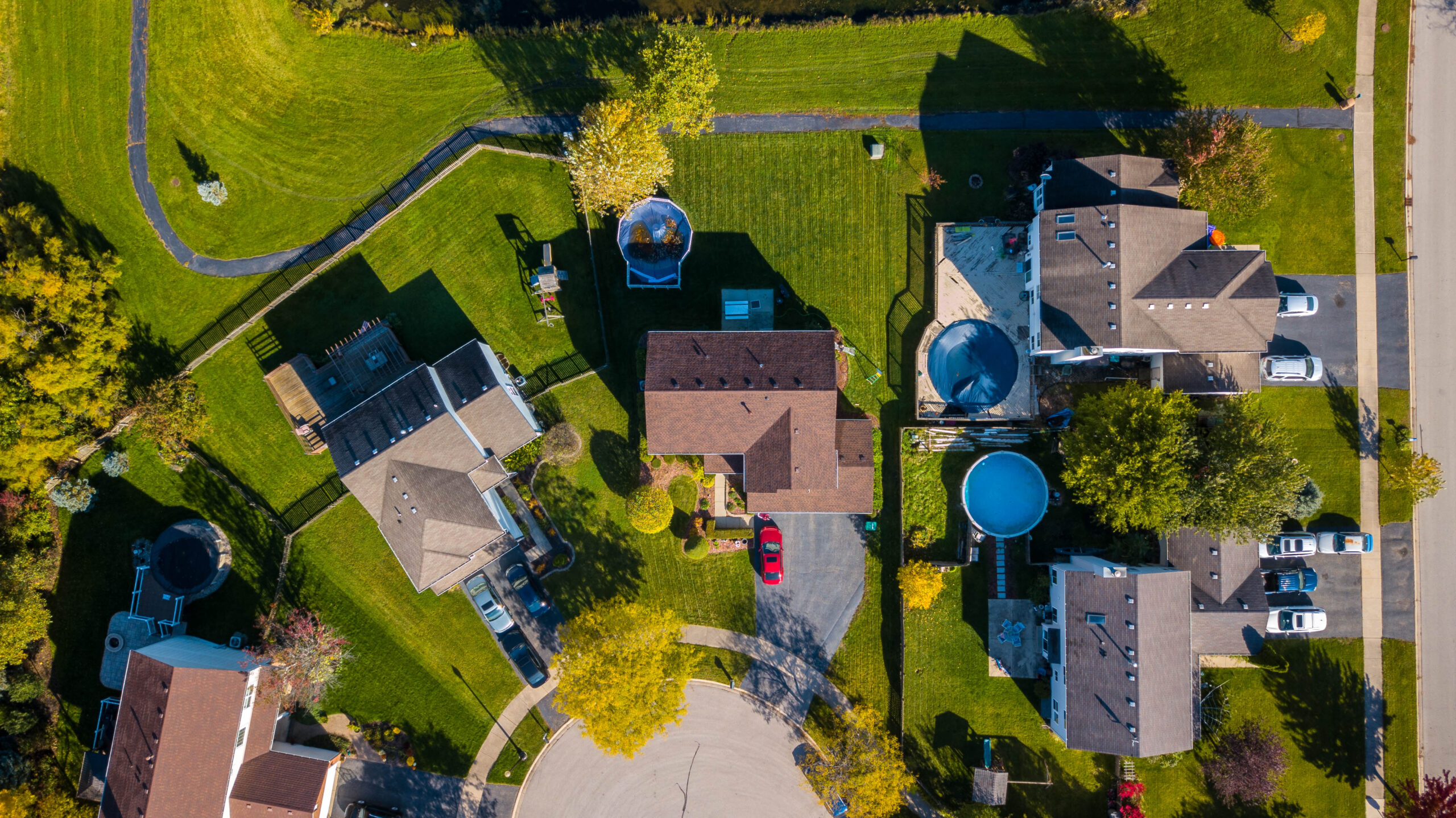 Overhead view of a residential property taken by a drone. Useful for real estate and commercial property listings.