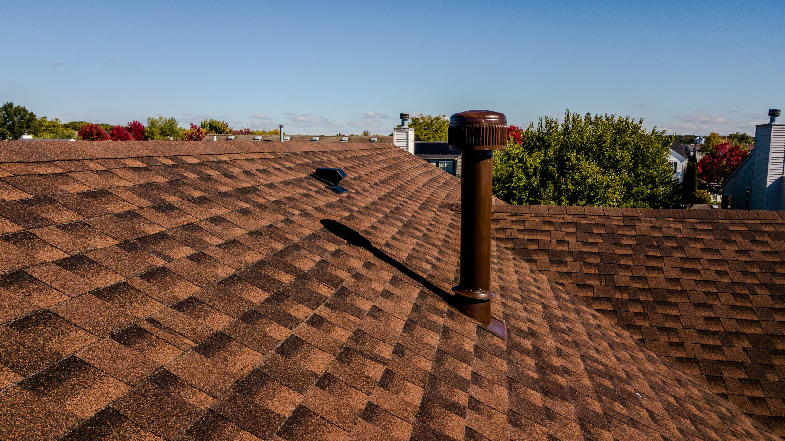Photograph of roof inspection taken by drone photography.